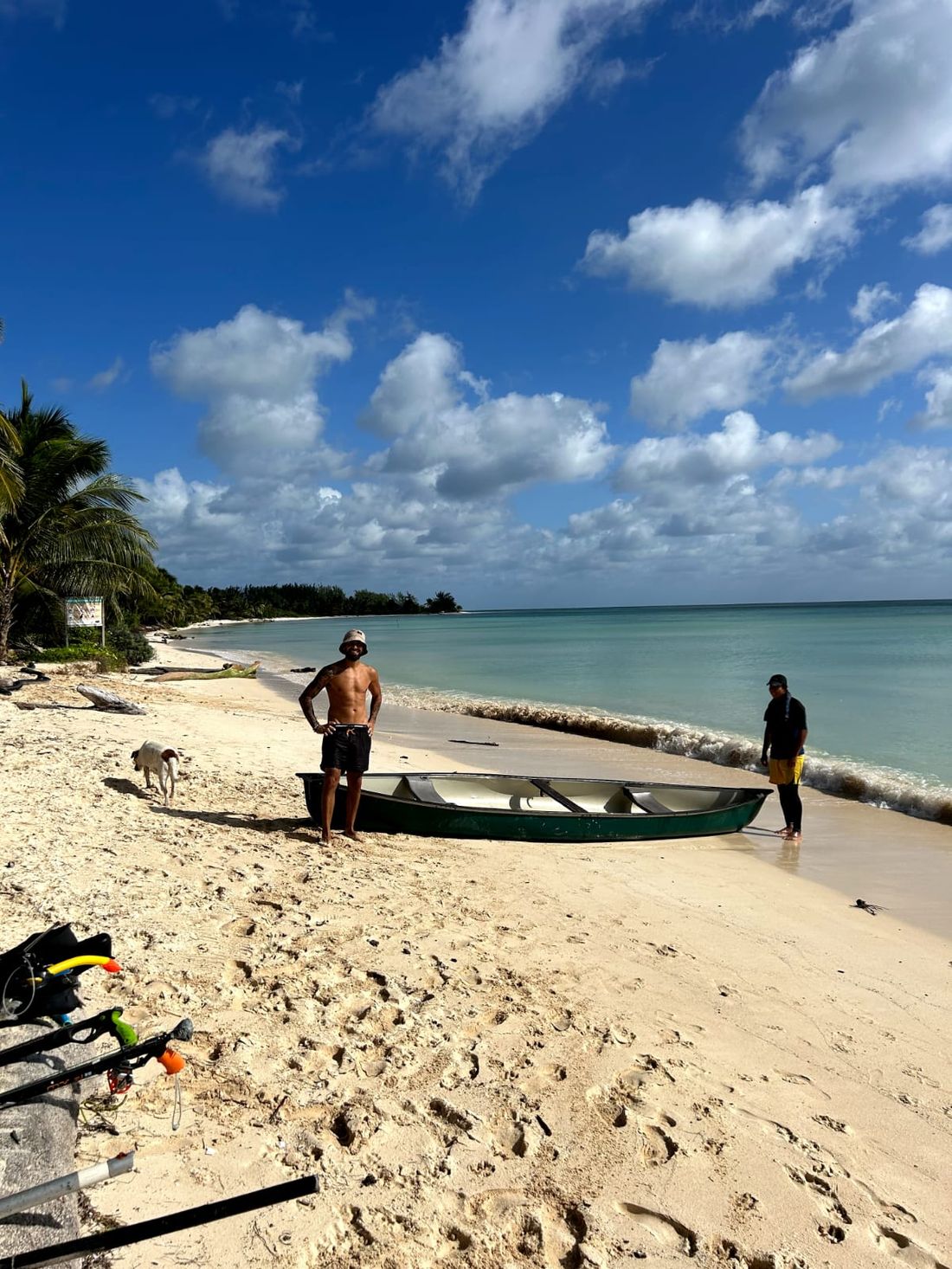Fishing boat on the empty beach at El Placer km 25.5, Costa Maya